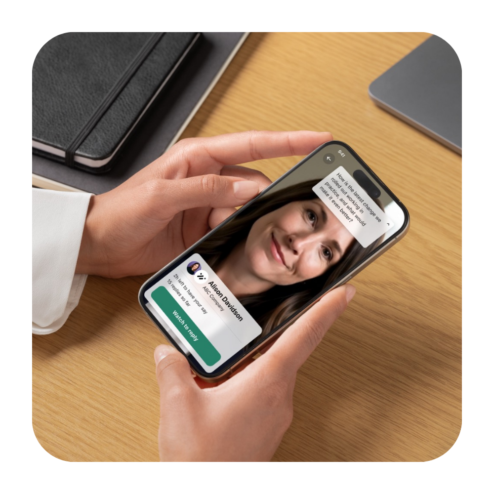 A person watching a loop on their phone